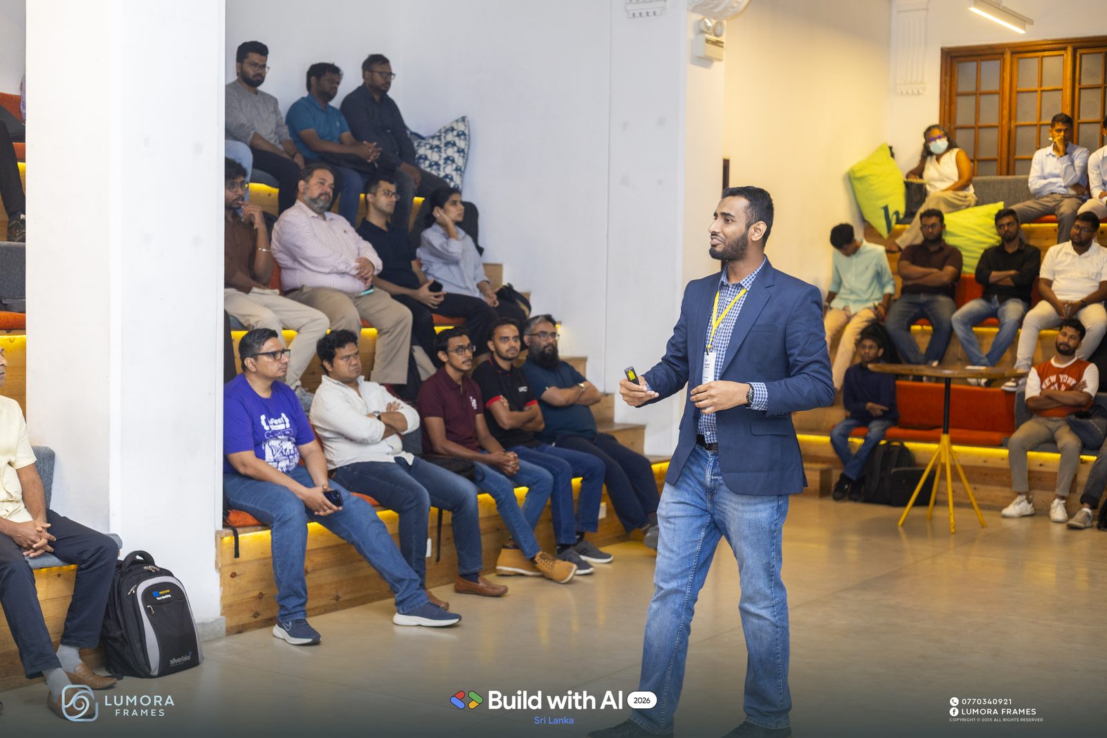 Ammar Ahamed presenting to a full room at Google Build with AI 2026, Hatch Works Colombo