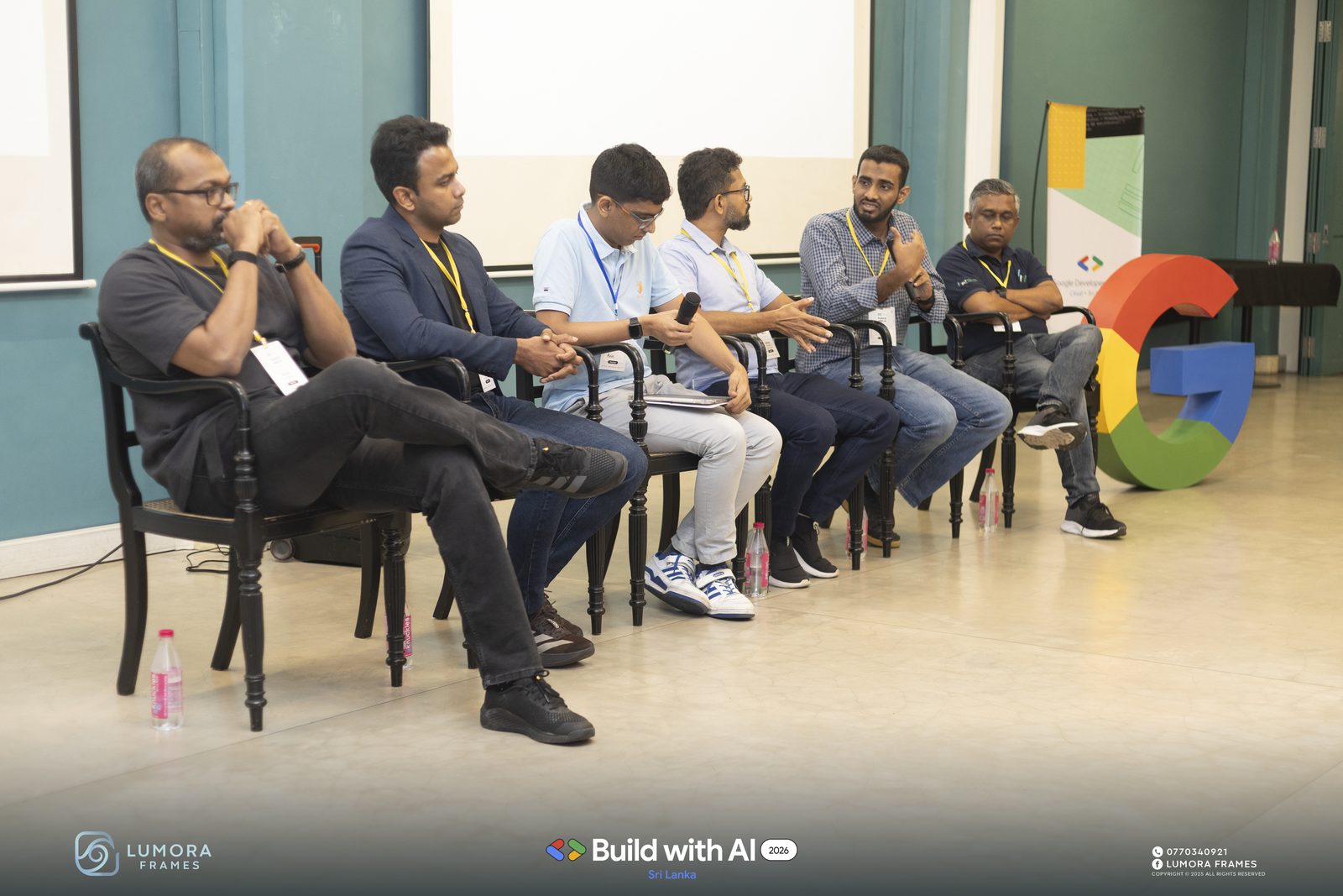 Panellists seated on stage at Google Build with AI 2026 by Google Developer Groups Sri Lanka, where Ammar Ahamed spoke and closed on the panel