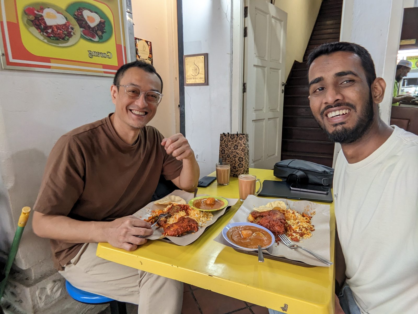 Ammar Ahamed at lunch at a Singapore hawker table, April 2026